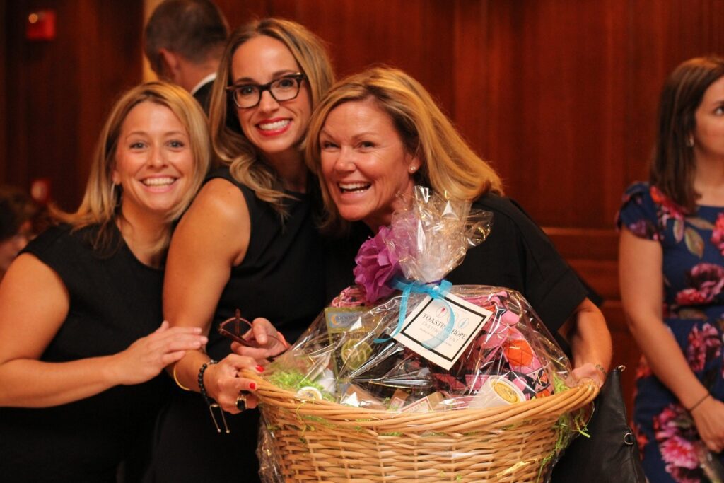 women with a gift basket